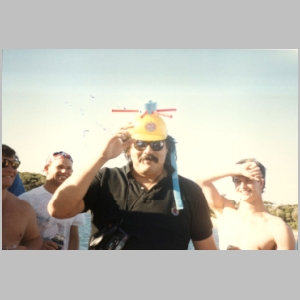 1988-08 - Australia Tour 037 - Raul Flores on Boat w Party Hat.jpg